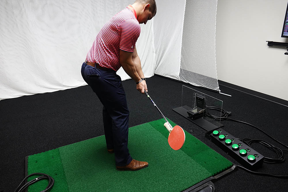 Ping_pong_paddle_drill_downswing The GOLFTEC Scramble